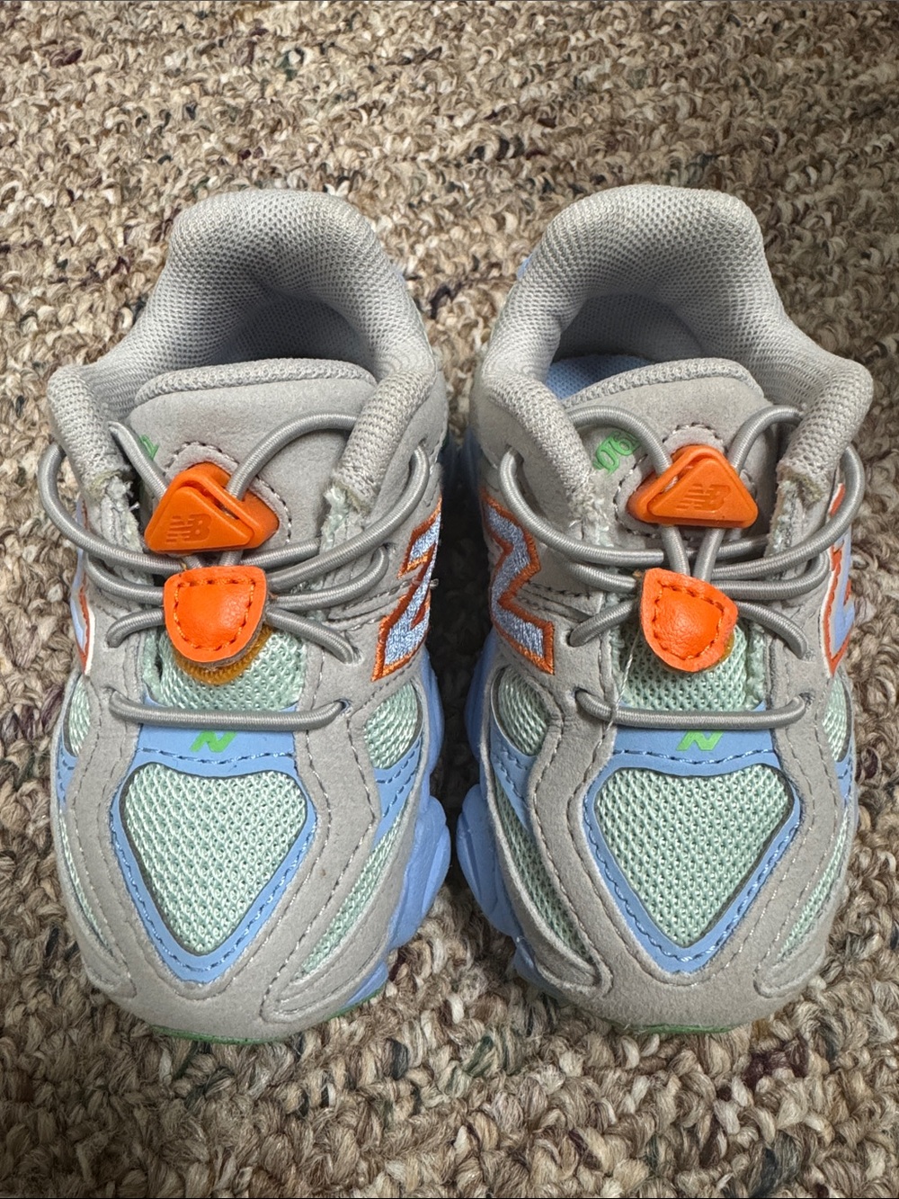 New Balance Kids Gray, Light Blue & Mint Sneakers with Orange Pull Tabs